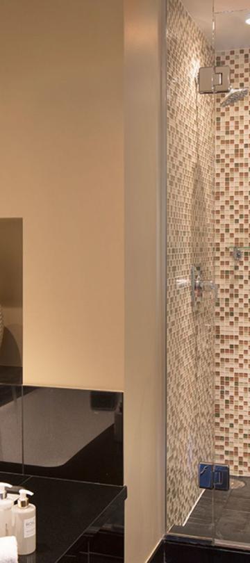 bathroom with a vanity and shower in a Pinnacle Three Bedroom Residential Suite at viceroy Snowmass