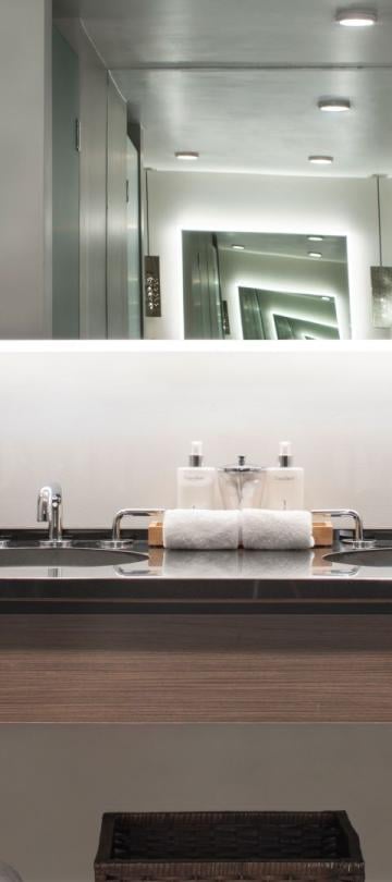 A double sink vanity in a Pinnacle Two Bedroom Premium Residence at Viceroy Snowmass