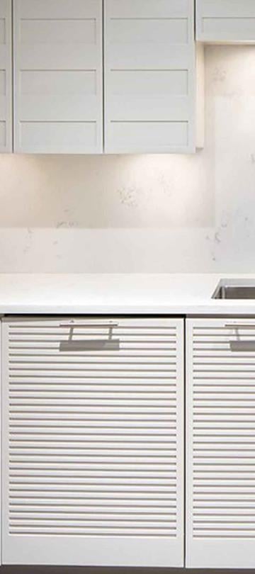 A beautiful white kitchen in a Pinnacle Two Bedroom Premium Residence at Viceroy Snowmass