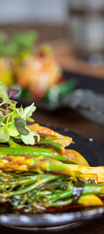 An up-close shot of a broccoli dish from The Cane Bar