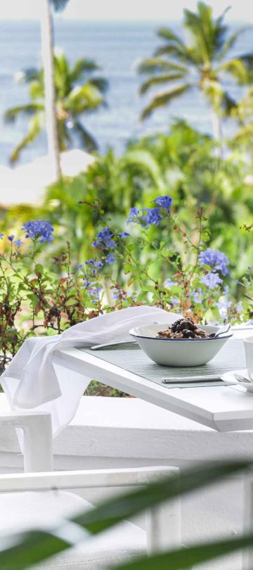 Terrace Restaurant, an outdoor dining space near the beach