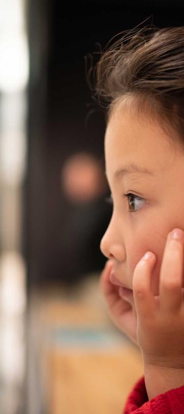A child looks at a museum exhibit in Washington, DC