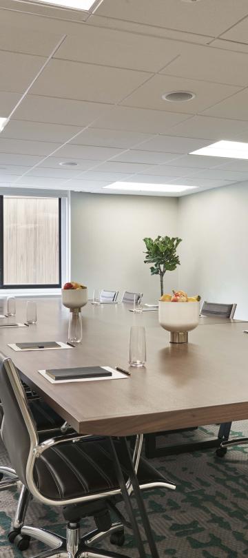 A conference table in a bright meeting room at Viceroy Washington DC