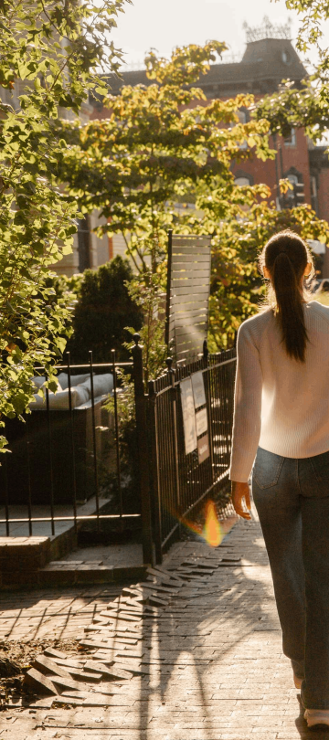 A woman walking down the street in Washington DC