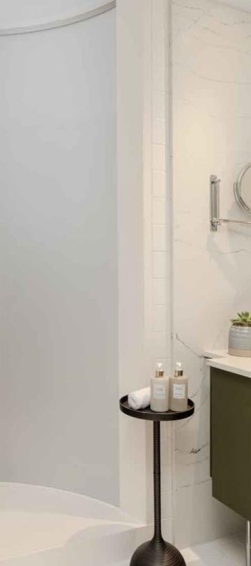 Shower and vanity in a room at Viceroy Zena Washington