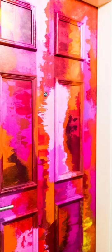 Colorfully painted hotel room doors at a Viceroy Hotel
