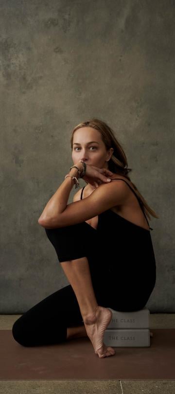 A woman posing with pointed toes