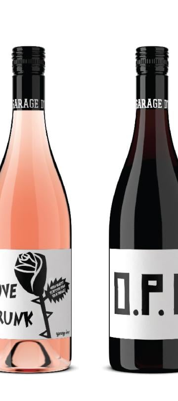 A row of Maison Noir wine bottles, with bold black and white graphical labels