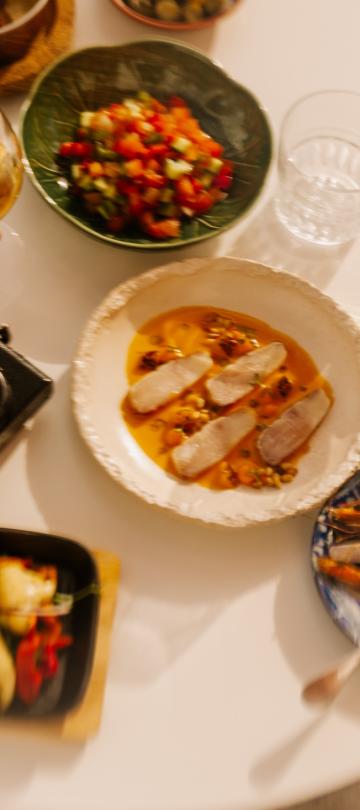 plates of food and personal items on table