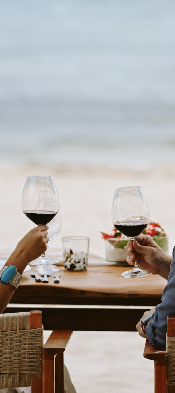 couple having dinner on beach