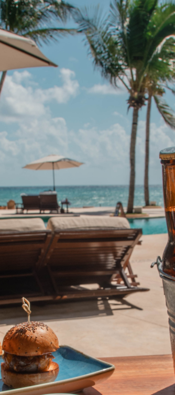 Bucket of drinks infront of pool