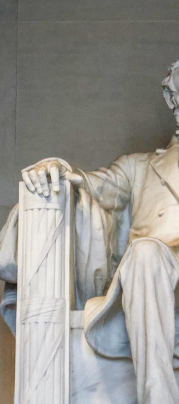 lincoln memorial, sitting in chair straightforward
