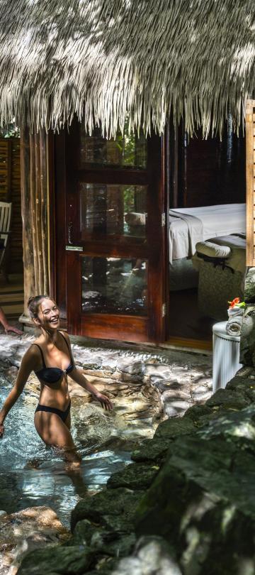 A couple in a spa-adjacent plunge pool