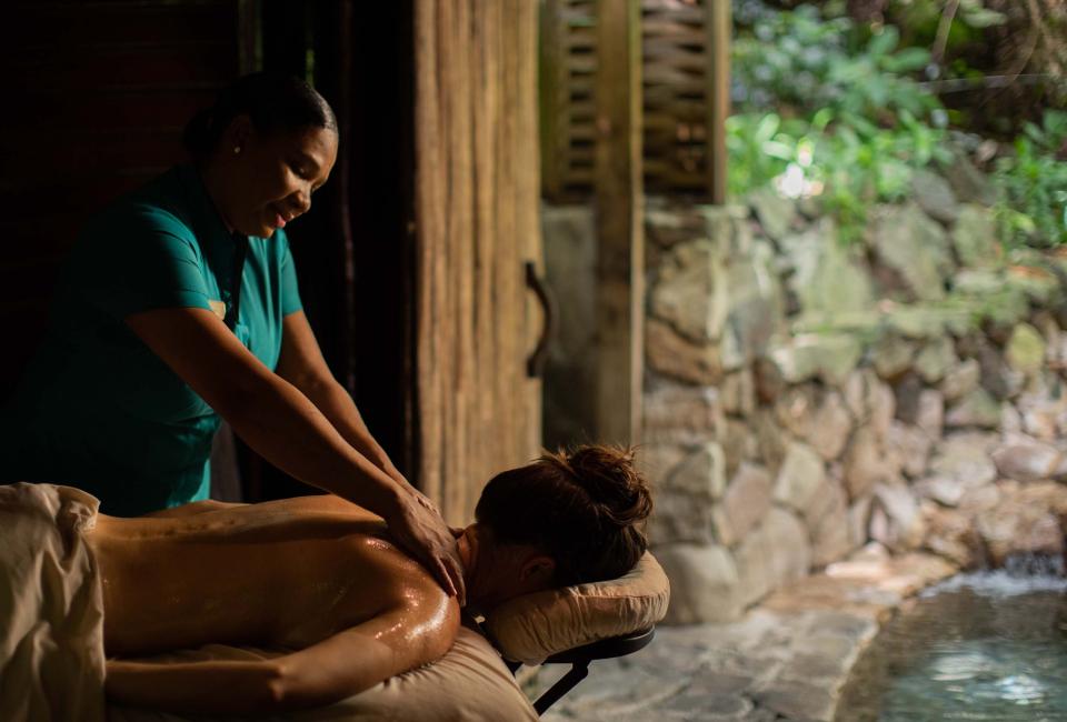 A woman receives a massage at Sugar Beach
