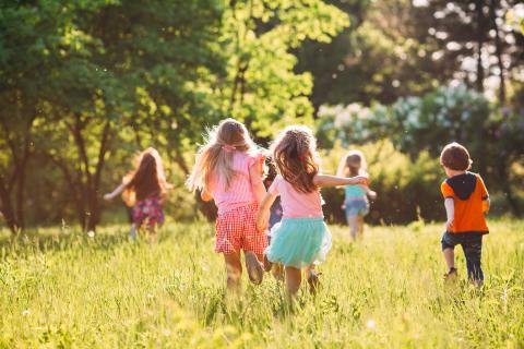 children running in a field