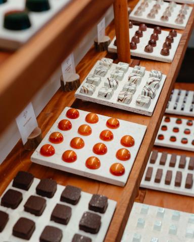 Display case full of various chocolates