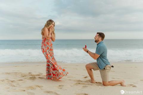 A man proposing to his girlfriend on the beach
