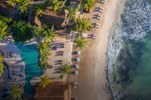 An aerial view of the pool and beach at Viceroy Riviera Maya.