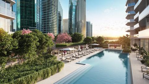 A canal-like pool runs between the buildings of the Viceroy Residences in Brickell