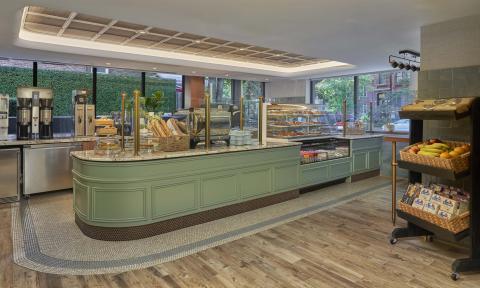 The bar at BPM Coffee & Wine and surrounding shelves with provisions