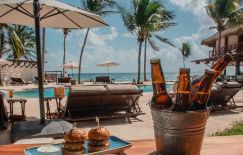 Bucket of drinks infront of pool