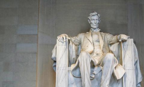 lincoln memorial, sitting in chair straightforward