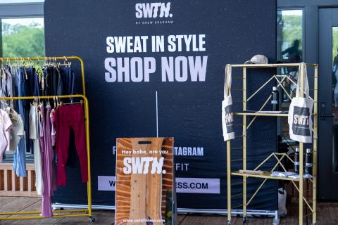 SWTN Pop-Up set with with banner and merchandise