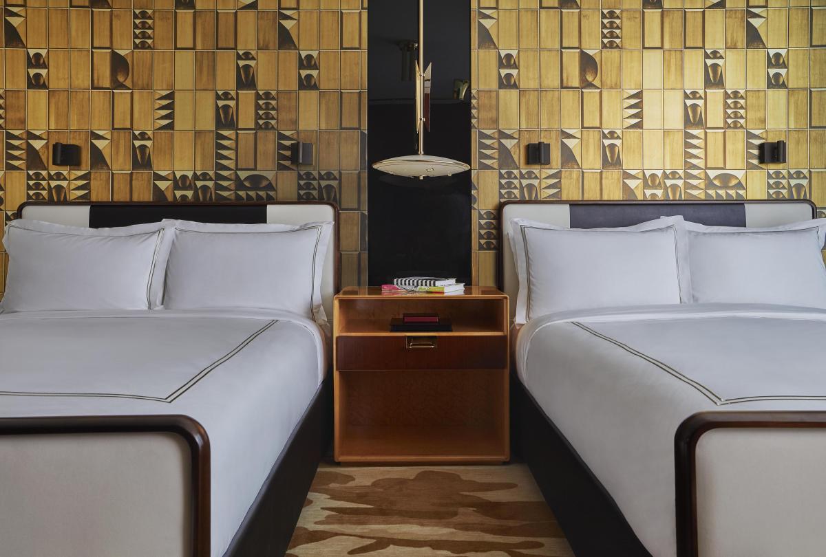 interior view of beds in Deluxe Queen Queen room at Viceroy Chicago