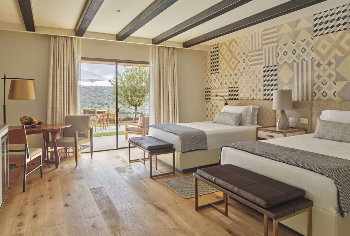 Two Queen beds in a deluxe queen room at Viceroy Ombria Algarve