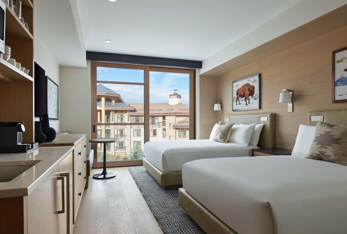 Two queen beds in a Snowmass guestroom
