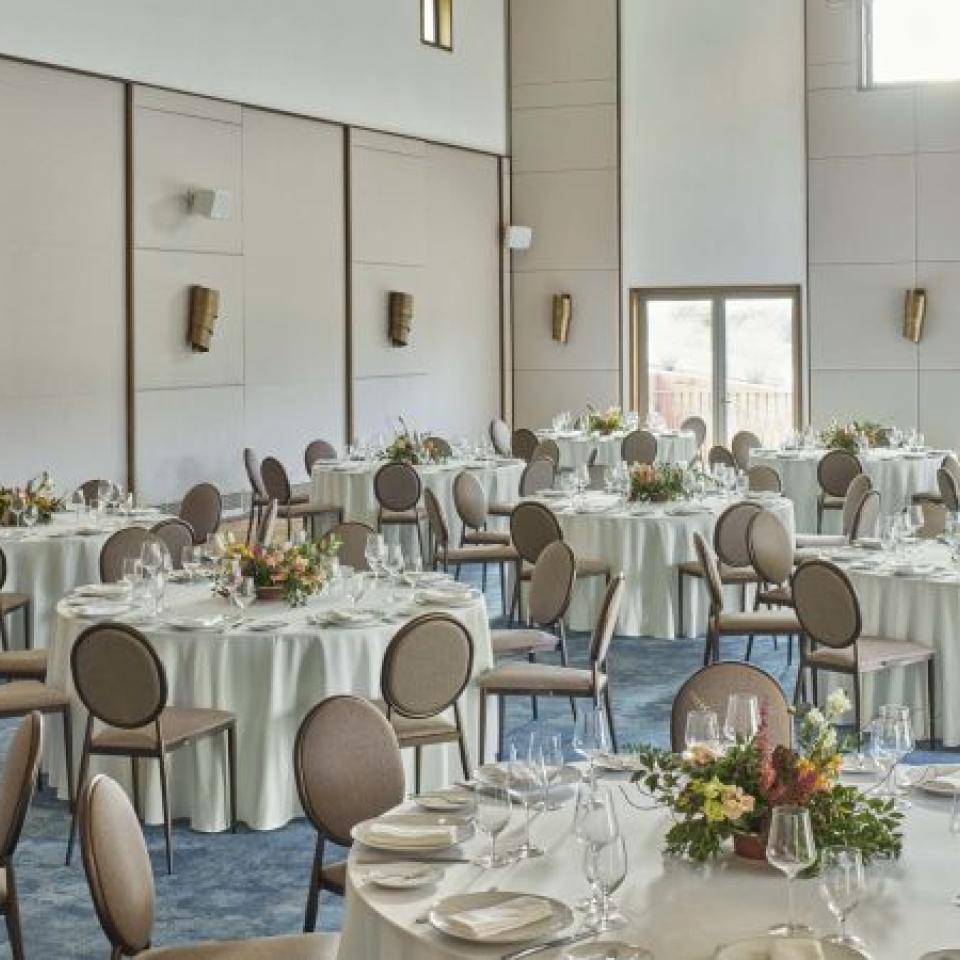 A ballroom decorated for a wedding