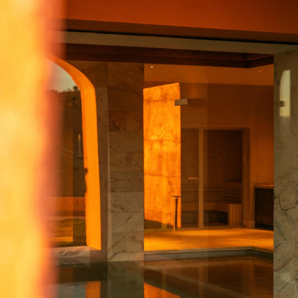 A view through a courtyard with a spa wading pool