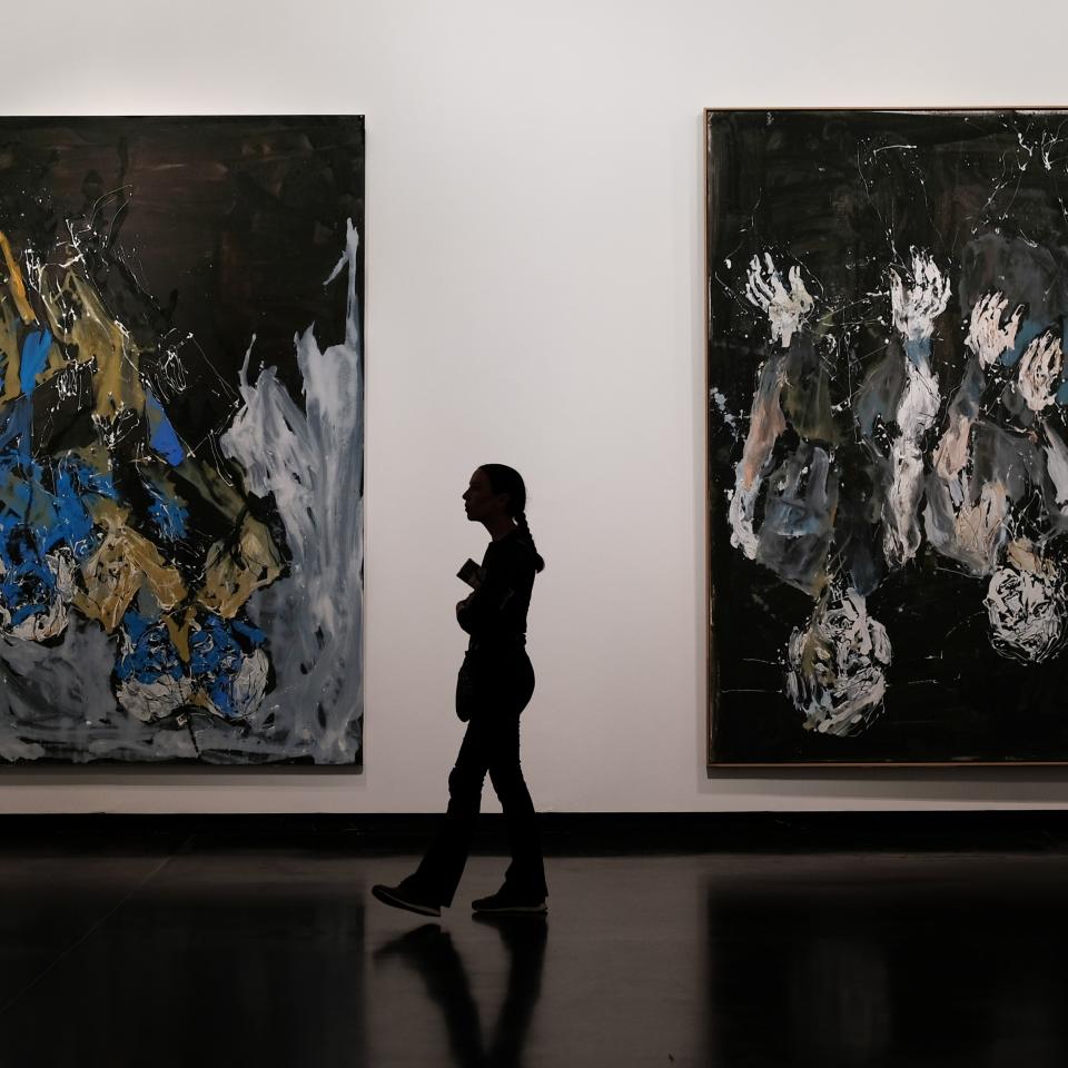 A person observes the art at Bergamot Station