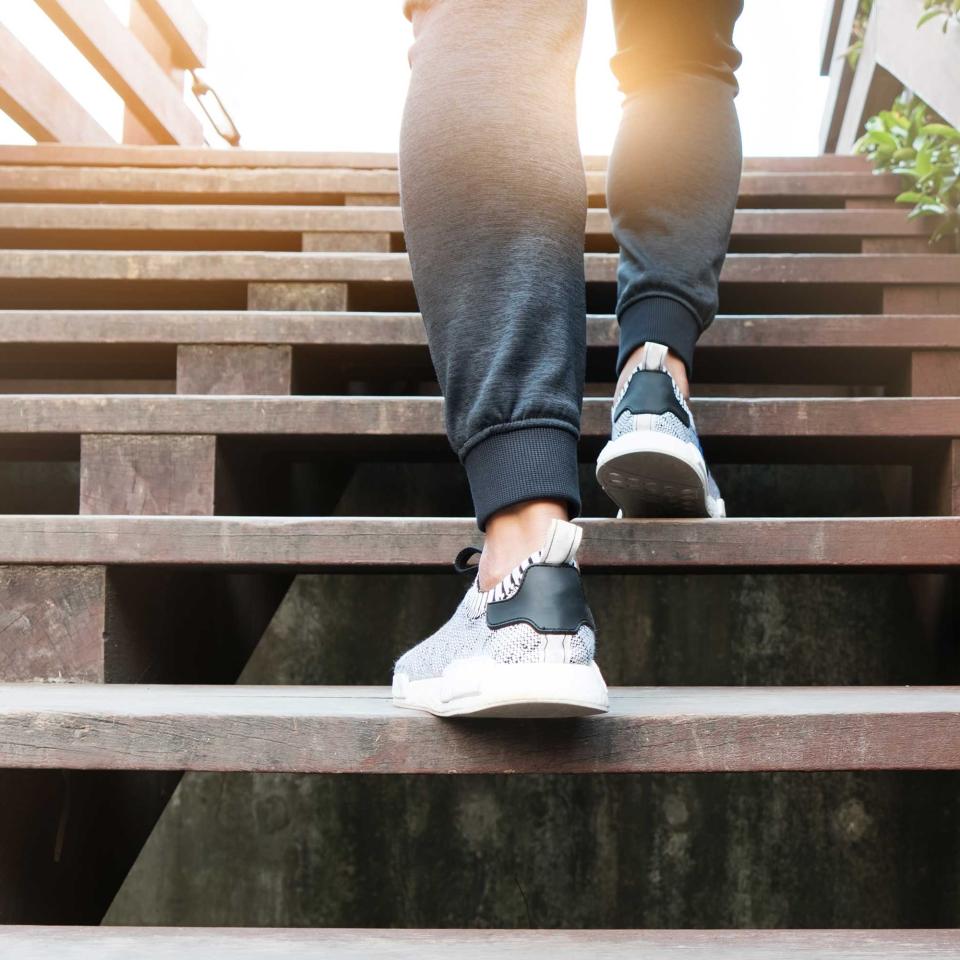 A person walking up the Santa Monica stairs