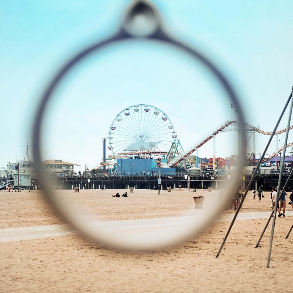 A view of Muscle Beach through a window