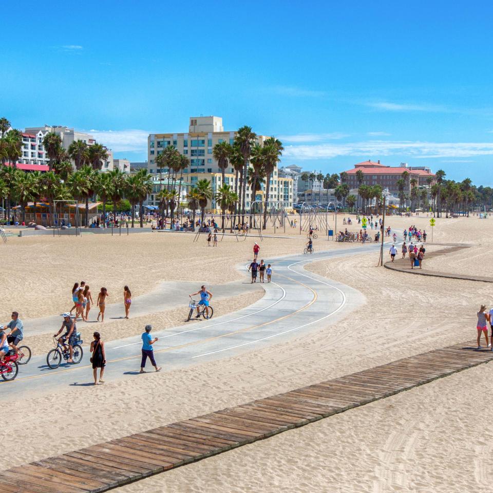 Cyclists and walkers on Santa Monica beach