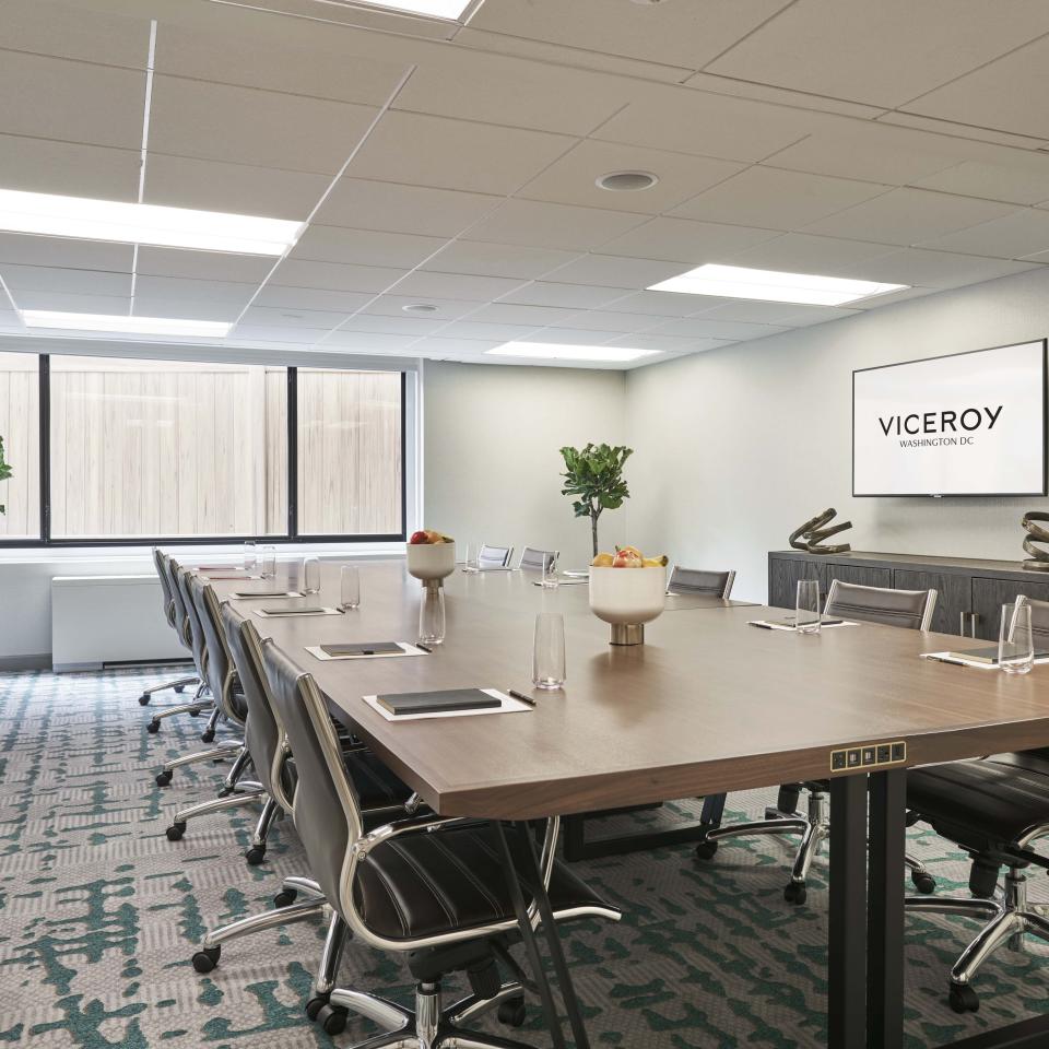 A conference table in a bright meeting room at Viceroy Washington DC