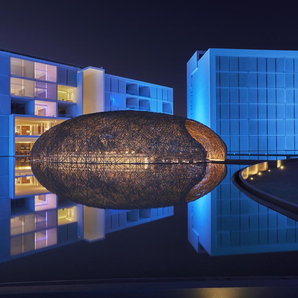 A nest-like dome over the restaurant Nido, built on a man-made pond at Viceroy Los Cabos