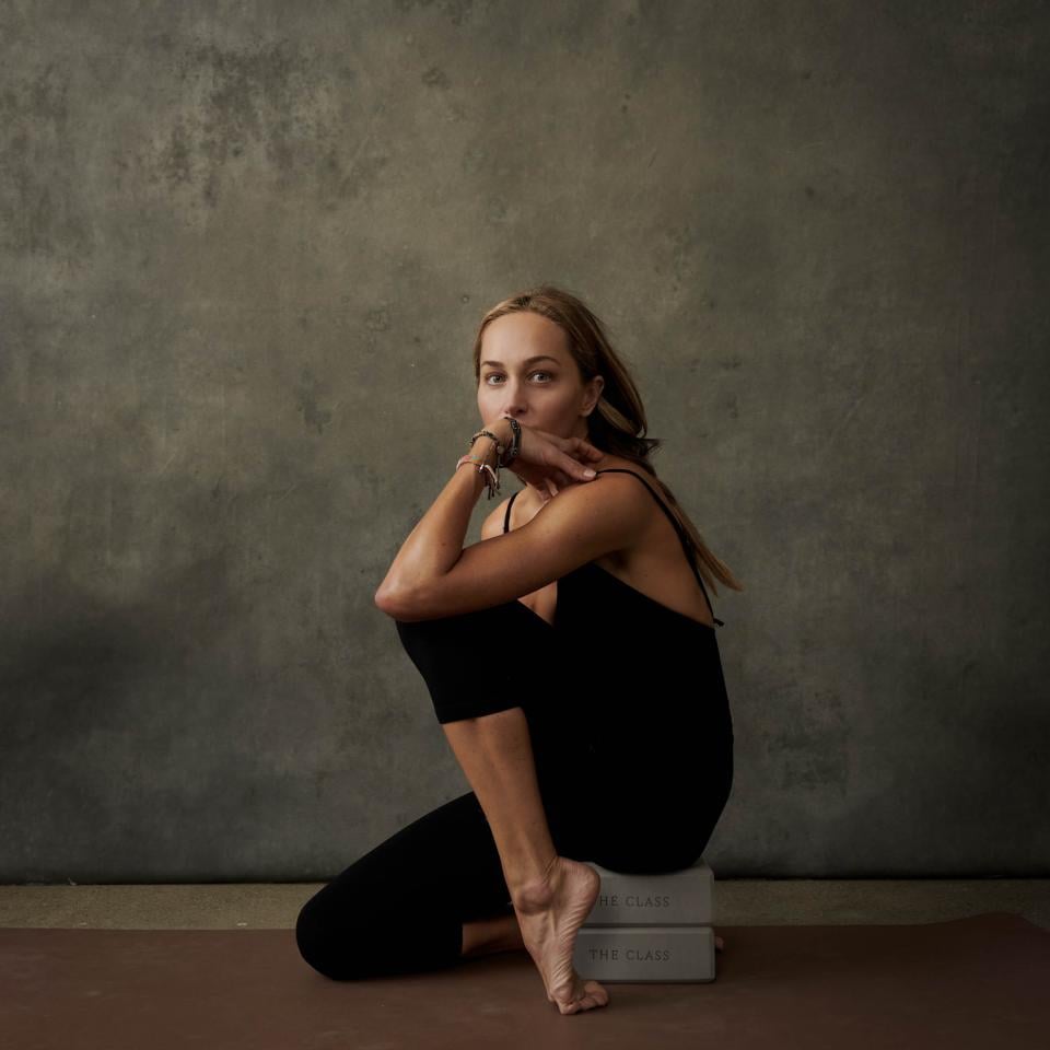 A woman posing with pointed toes