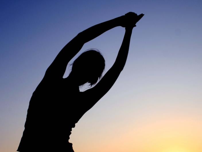 shadow of a person stretching