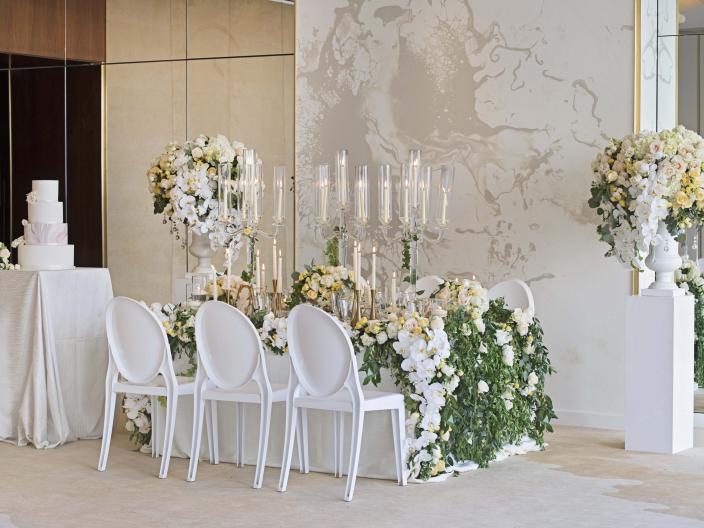 Indoor venue decorated for a wedding reception