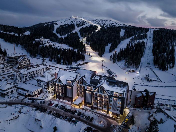 An aerial view of Viceroy Kopaonik Serbia, with the ski slope behind it