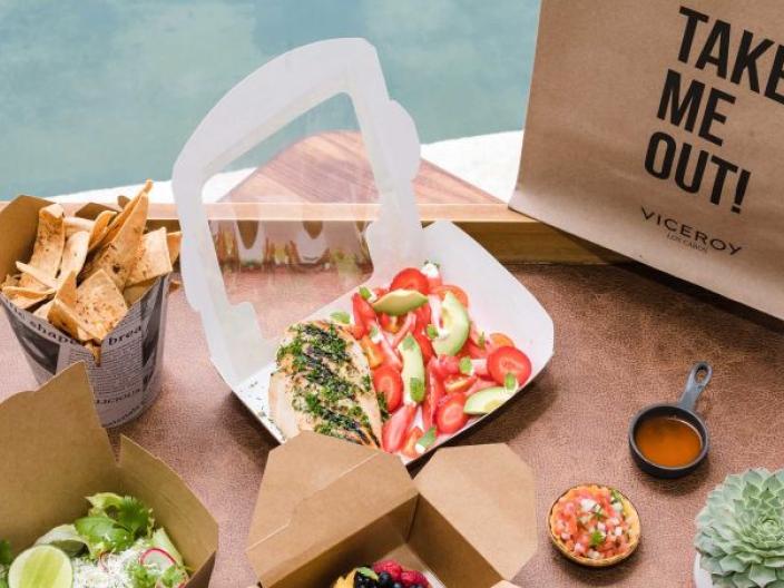 A take out box with a picnic lunch