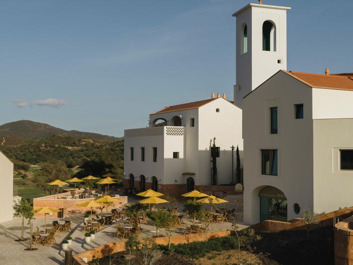 A row of white buildings with orange roofs at Viceroy Ombria Algarve