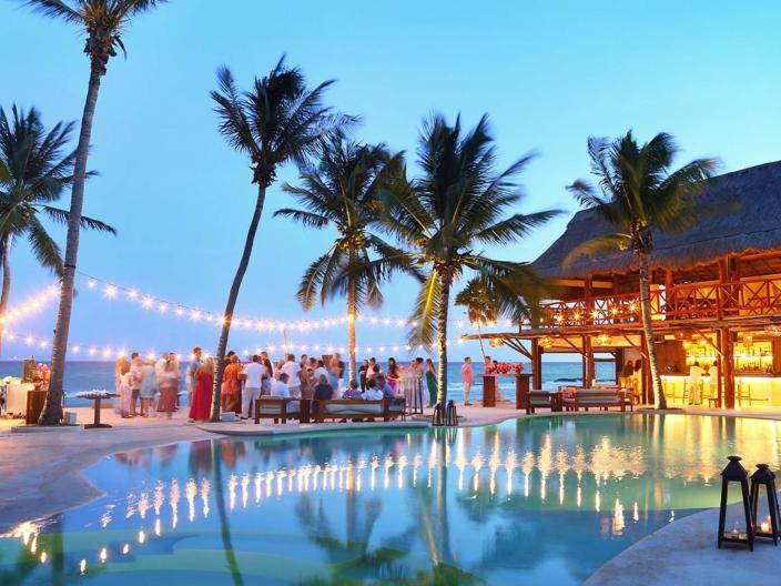 A wedding reception at dusk at Riviera Maya