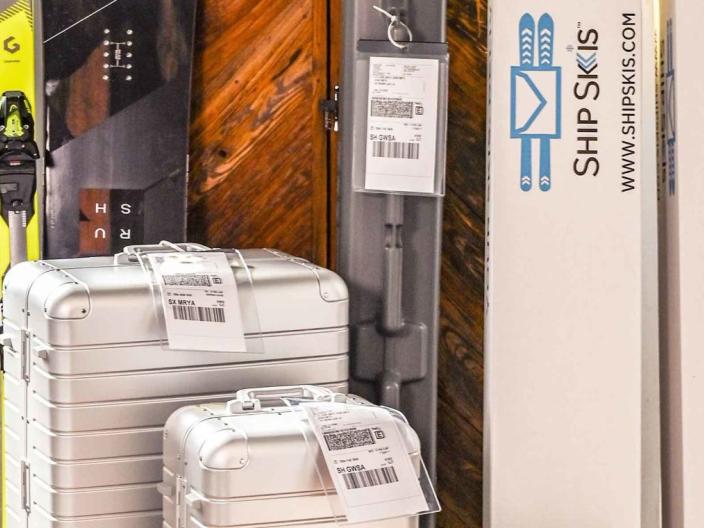 A collection of skis and luggage