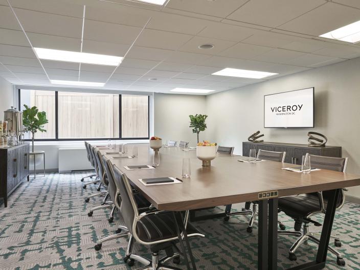 A conference table in a bright meeting room at Viceroy Washington DC