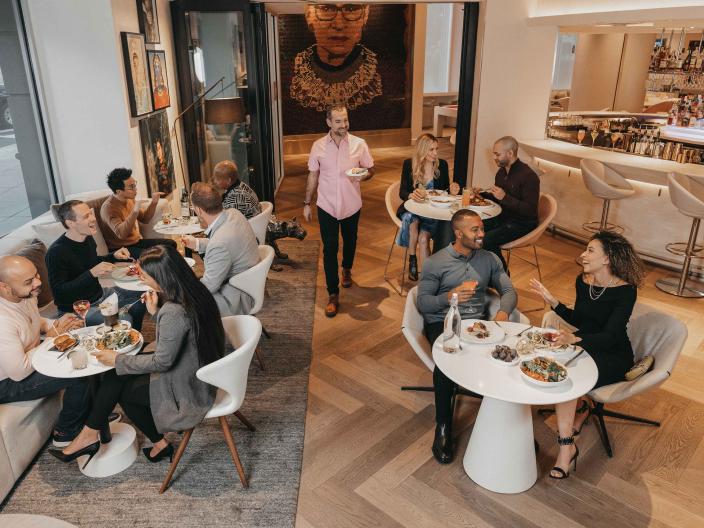 An aerial view of the dining room full of patrons at Hotel Zena's Figleaf restaurant
