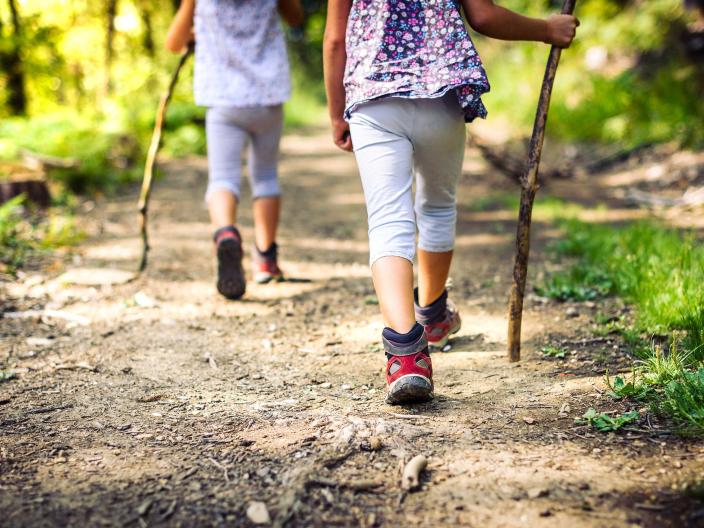 Two children walking on a path in Washington DC