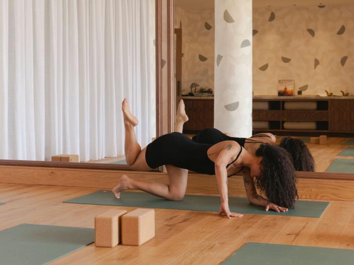 a woman in a yoga pose